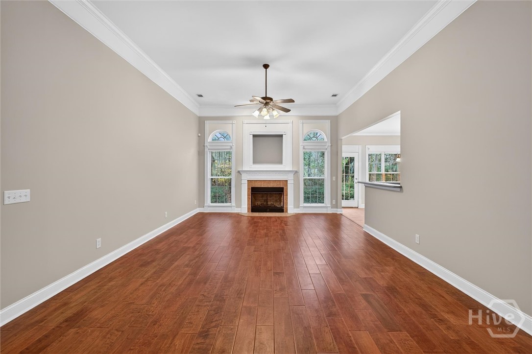Family room with beautiful gas fireplace as the centerpiece of the room