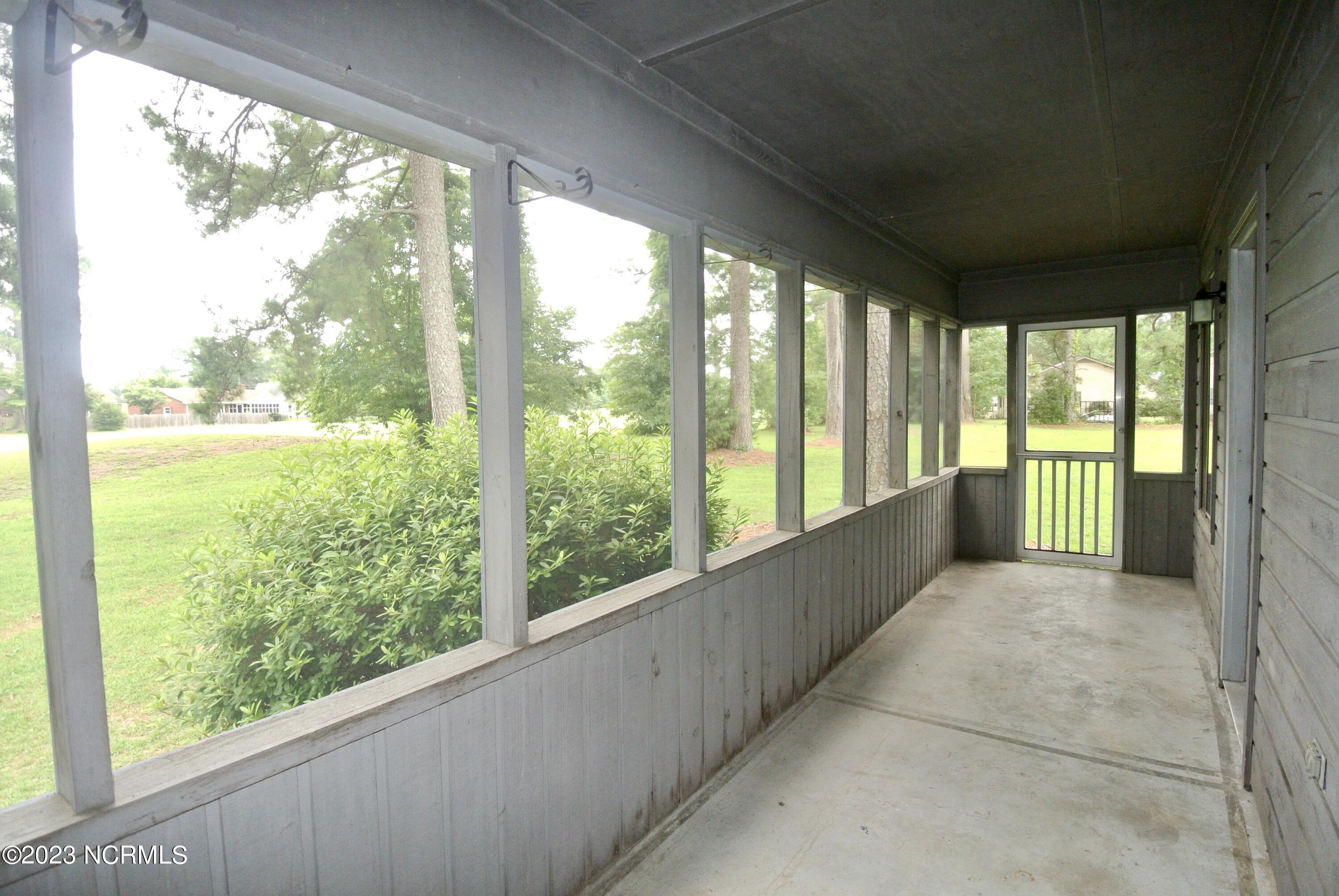 Screened-in back porch