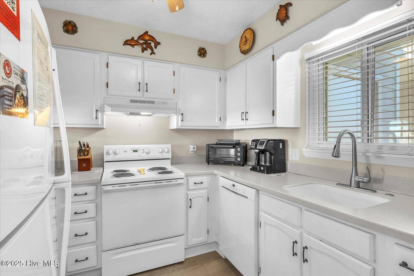 1000 Caswell Beach Road, Oak Island, NC 28465 – photo 19: 1000 Caswell Beach Road 1303 Kitchen 3