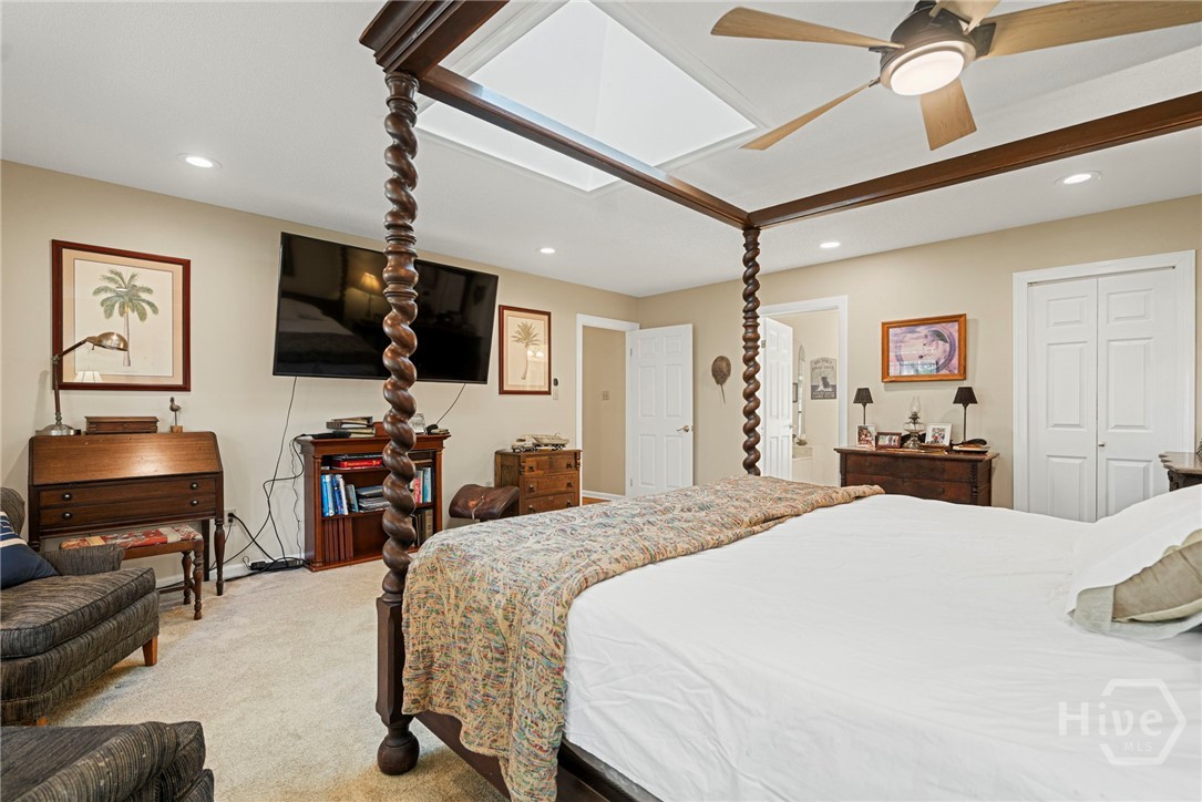 Primary bedroom overlooking the water
