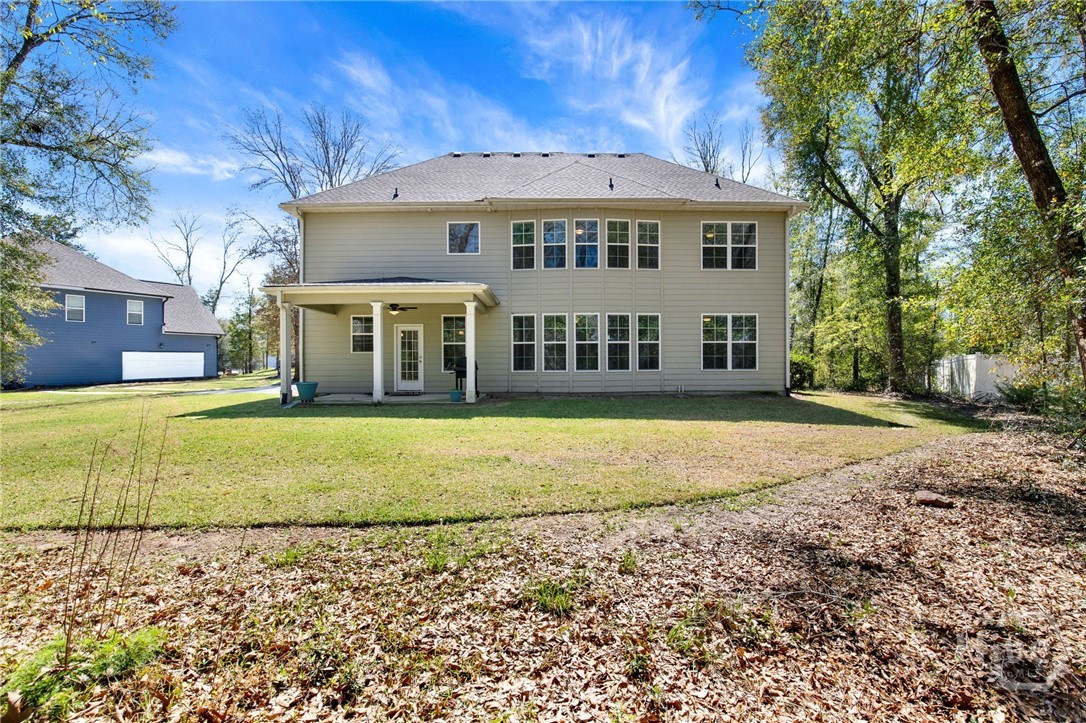 Backyard with Covered Outdoor Living Space