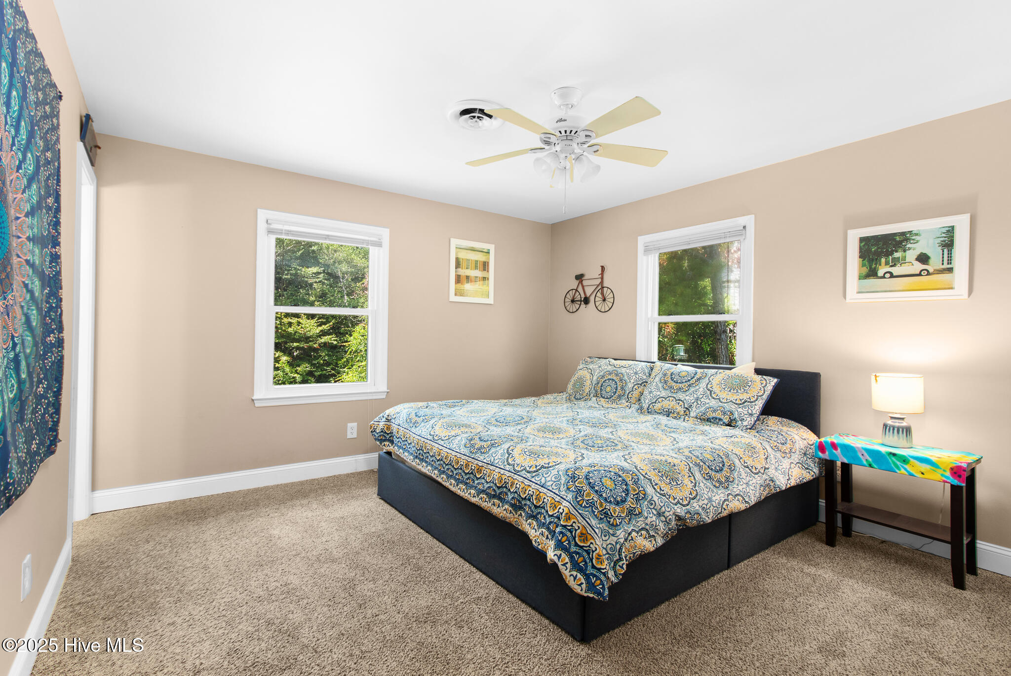 Primary suite overlooking backyard