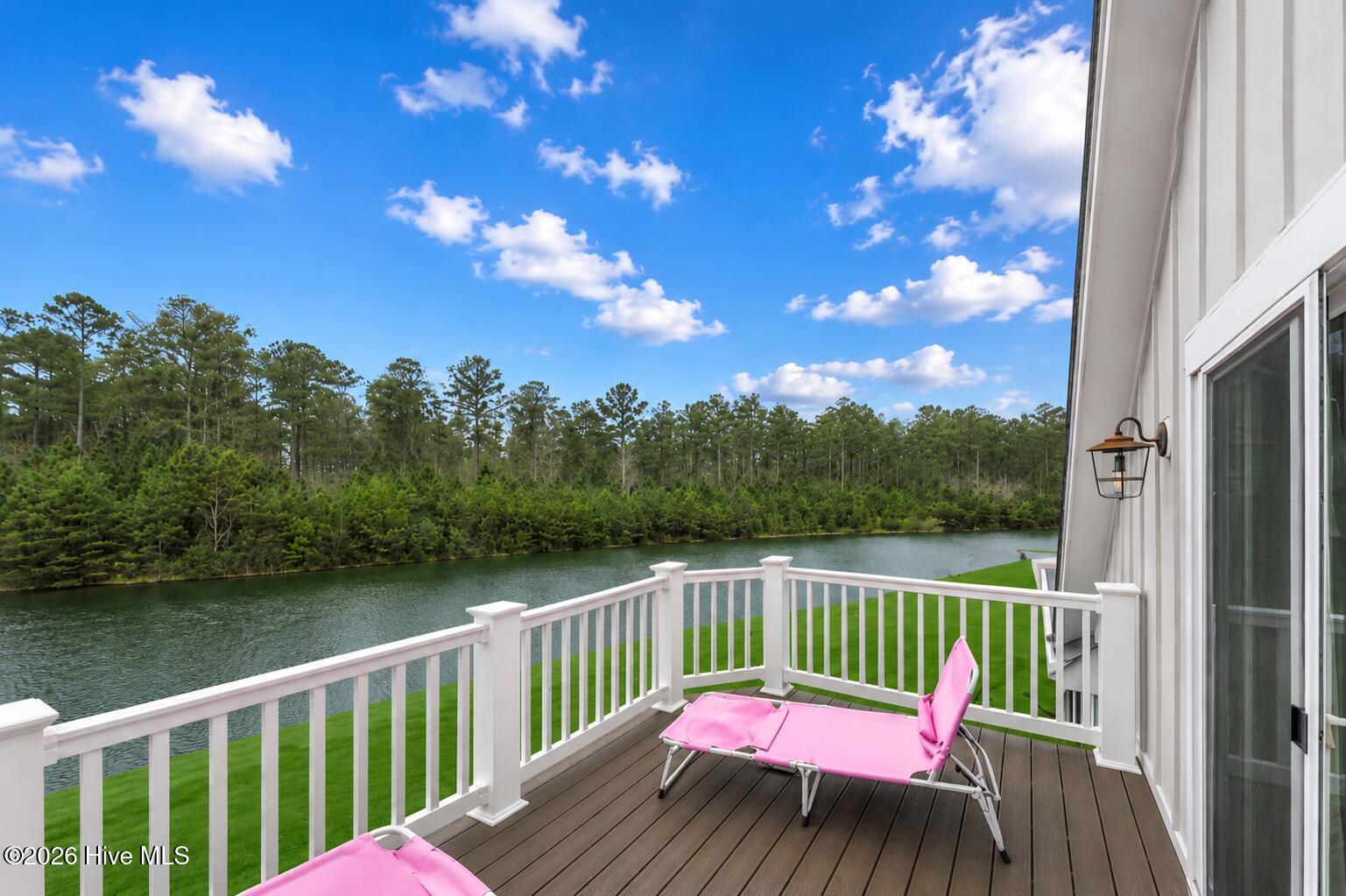 2nd story balcony overlooking the lake off of the 4th bedroom