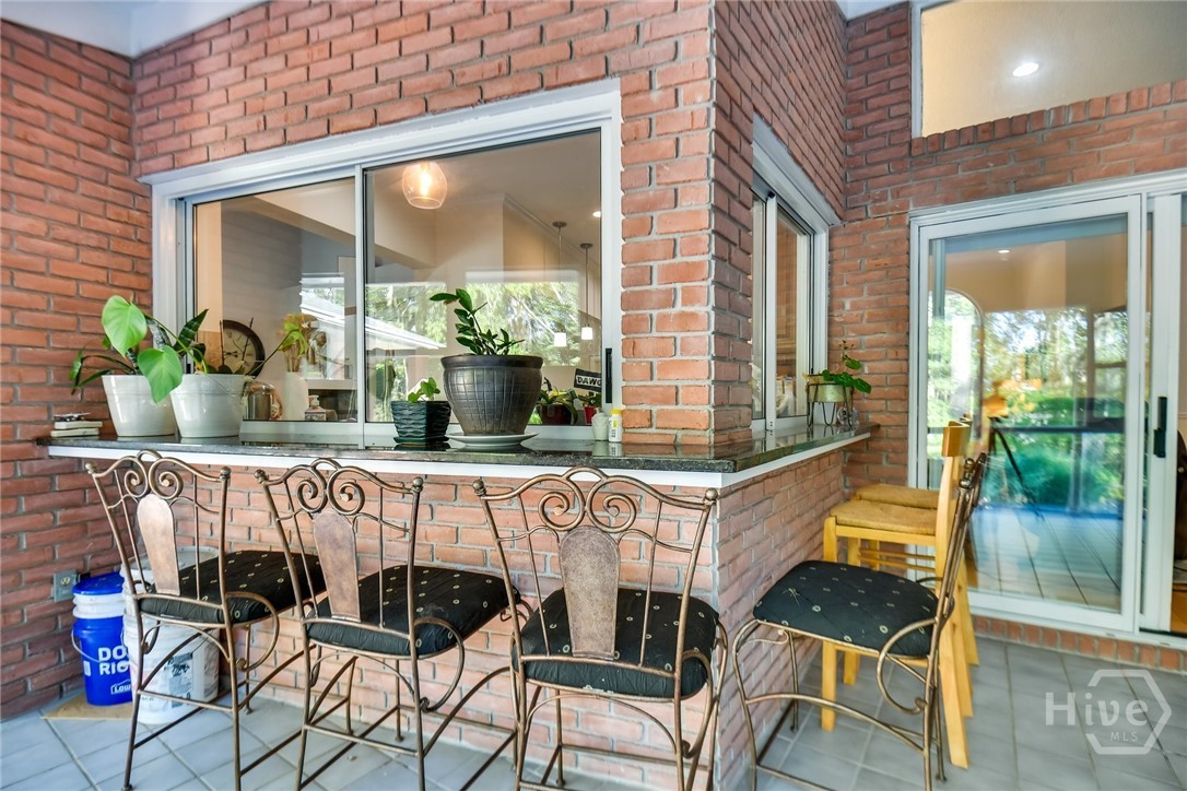 The enclosed patio off the kitchen