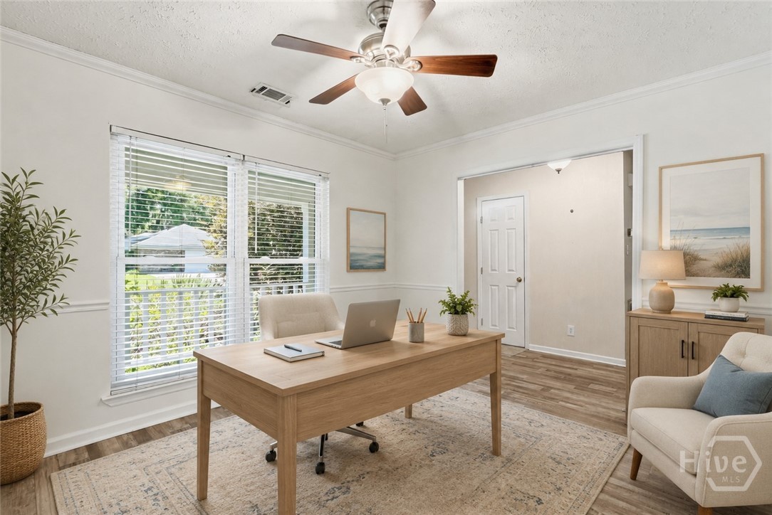 Flex room has been virtually staged as a home office.