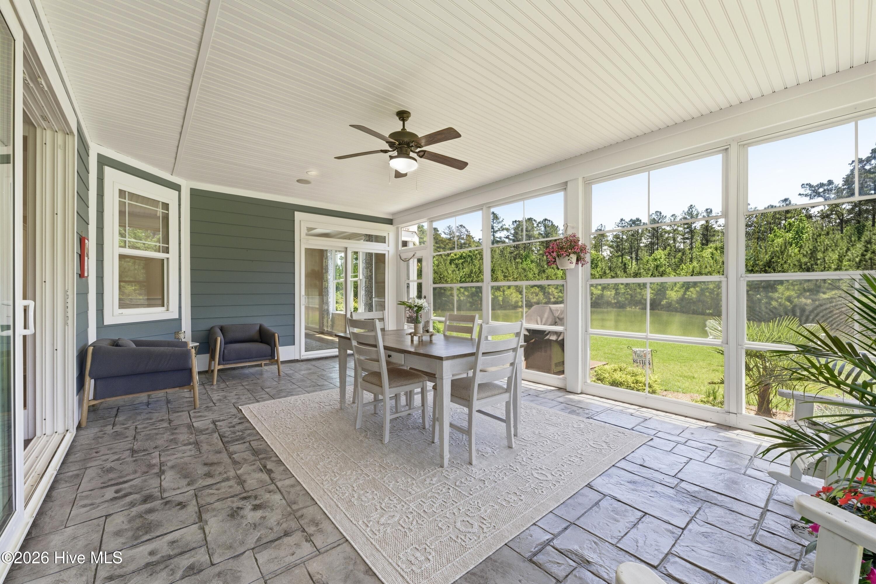 screened in porch with tile accent floor