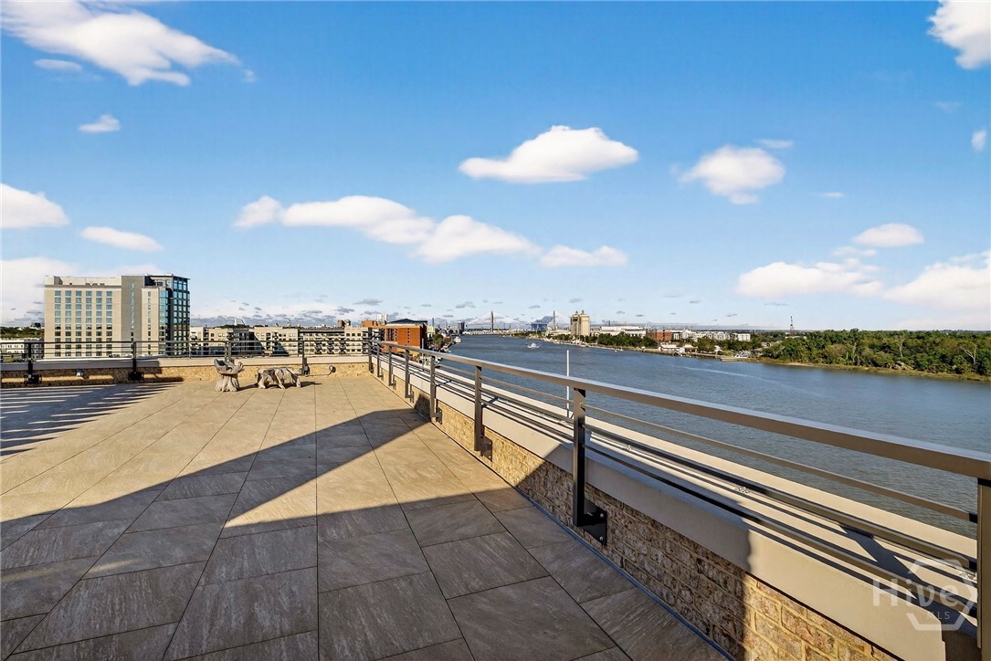 This elevated terrace, exclusive only to the Penthouse, offers unobstructed river and city views from a spacious, stone-framed platform. The layout supports multiple seating zones and open-air relaxation, ideal for hosting or quiet reflection. A commanding vantage point with timeless appeal.