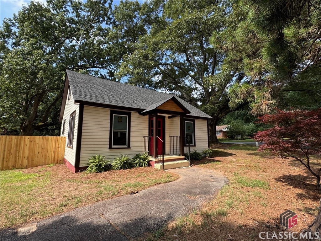 Sold before published. Complete, down to the studs renovation. New LVP flooring, new electrical system, new plumbing, new roof, new windows, all new stainless steel appliances. Kitchen with butcher block counters and Ikea cabinetry. Main floor bathroom with tub/shower with subway tile surround. Laundry room. New rear deck and privacy fencing. Large, open pole barn in the backyard. Upstairs finished attic with mini-split HVAC. Main level serviced by central HVAC with new ductwork.