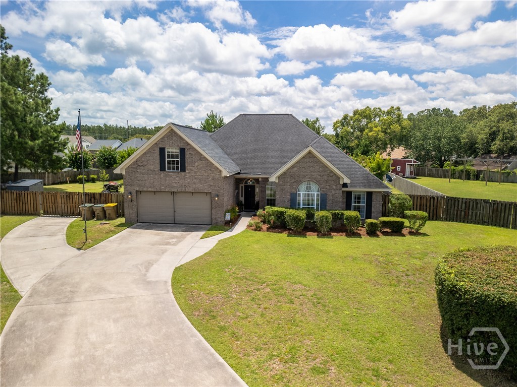 Welcome to 320 Grist Mill Ct in the desirable Mill Creek subdivision of Rincon. Tucked away on a quiet cul-de-sac, this all-brick home features 4 bedrooms, 3 baths, and a dedicated office and NO HOA. Inside, you'll find vaulted ceilings, a cozy fireplace, and an inviting layout designed for comfortable everyday living. Situated on one of the largest lots in the neighborhood at 0.77 acres, the fully fenced backyard offers endless possibilities with a greenhouse, garden area, and plenty of room to entertain, play, or relax. Built in 2006, this home combines space, privacy, and a prime location.