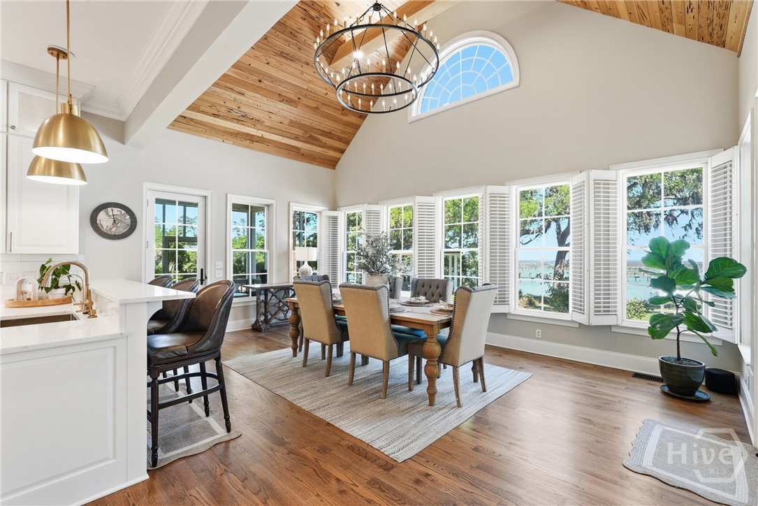 Dining area off kitchen, vaulted wood ceiling