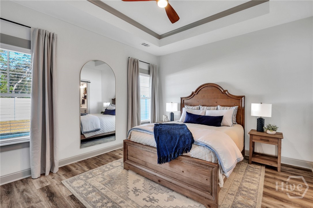 PHOTOS OF A PREVIOUSLY BUILT BRINSON PLAN BY LAWRENCE ALEXANDER HOMES.