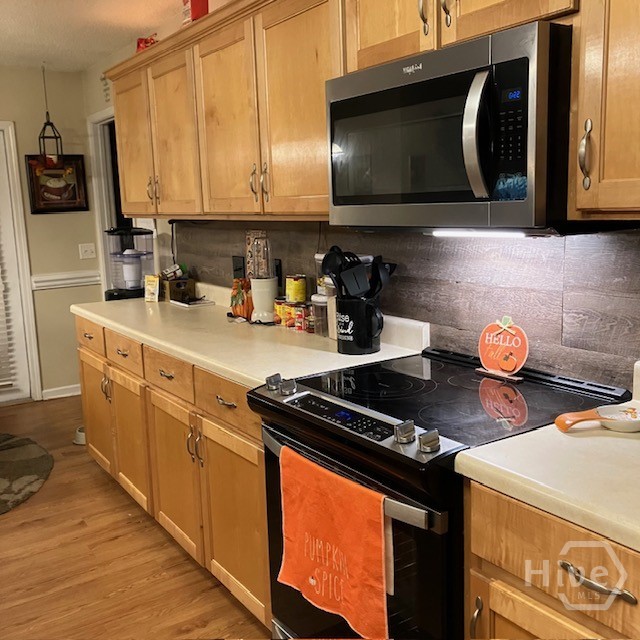 Kitchen - stove side.  Lots of cabinets.