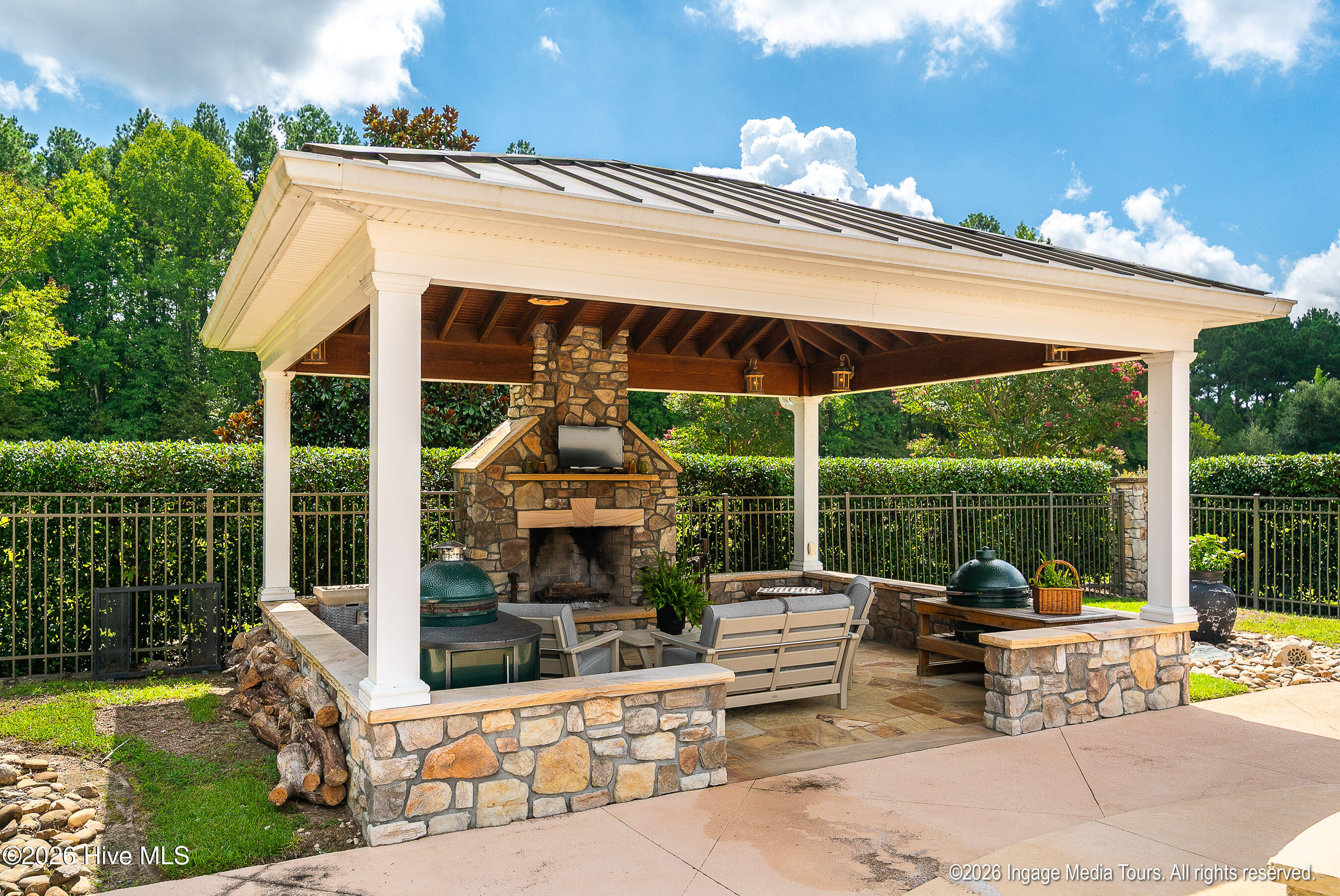 Covered pavilion with stone fireplace.