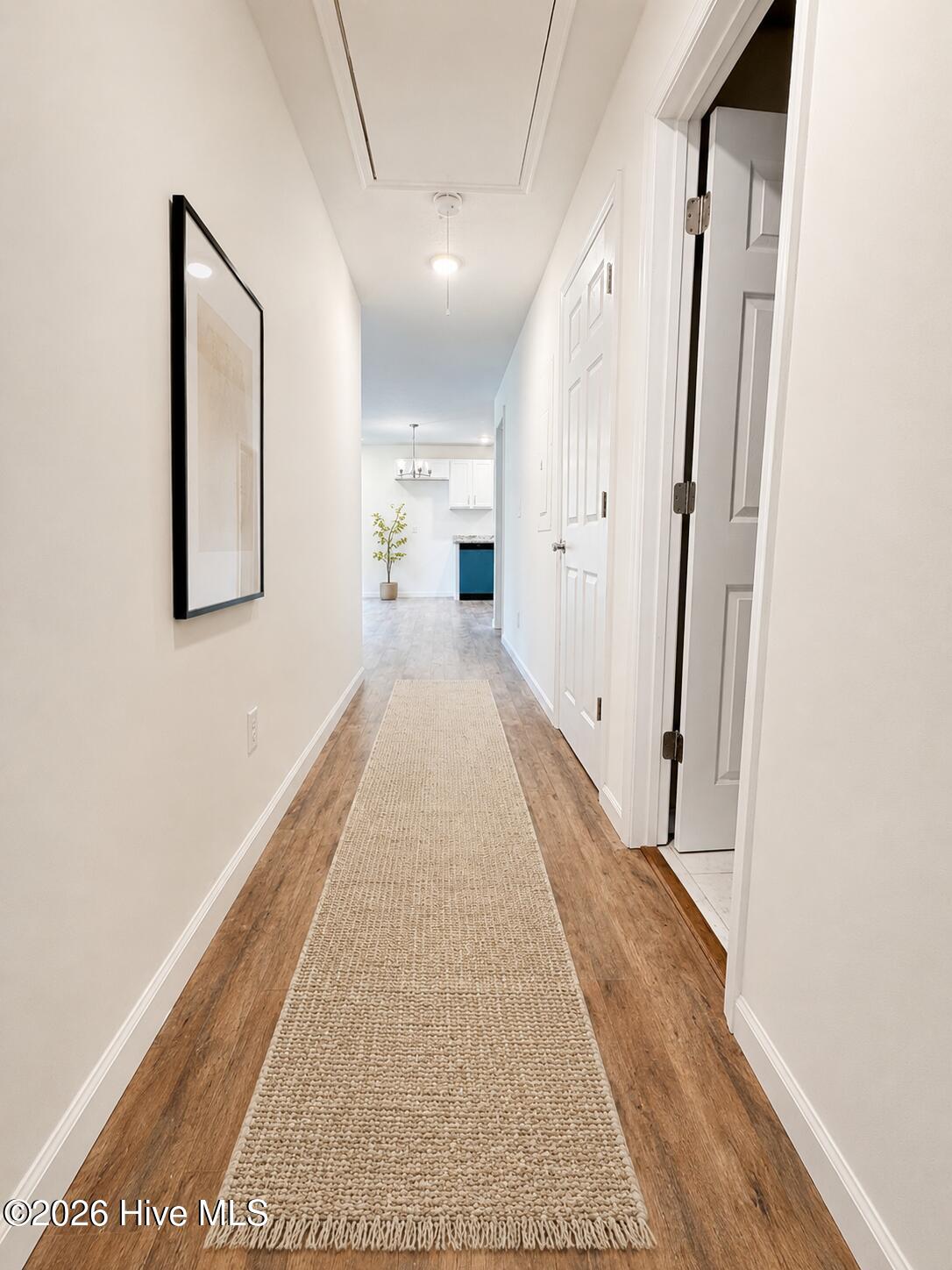 01_minimalist_hallway_leading_to_kitchen