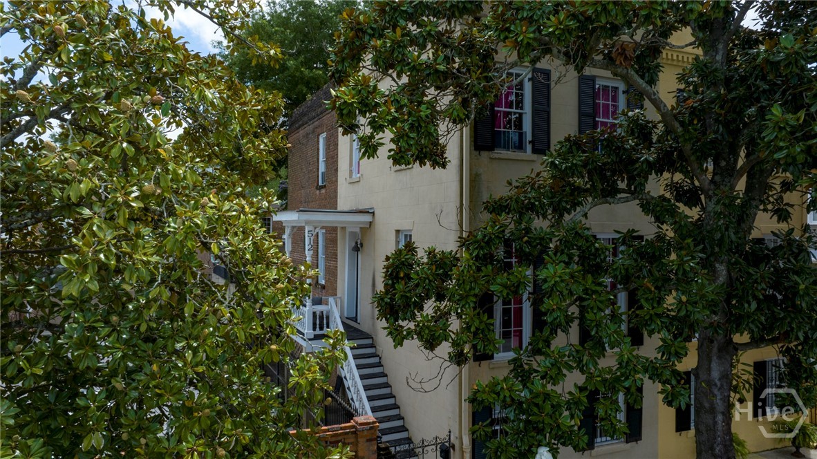 View of stairwell that ascends to the upper two-st
