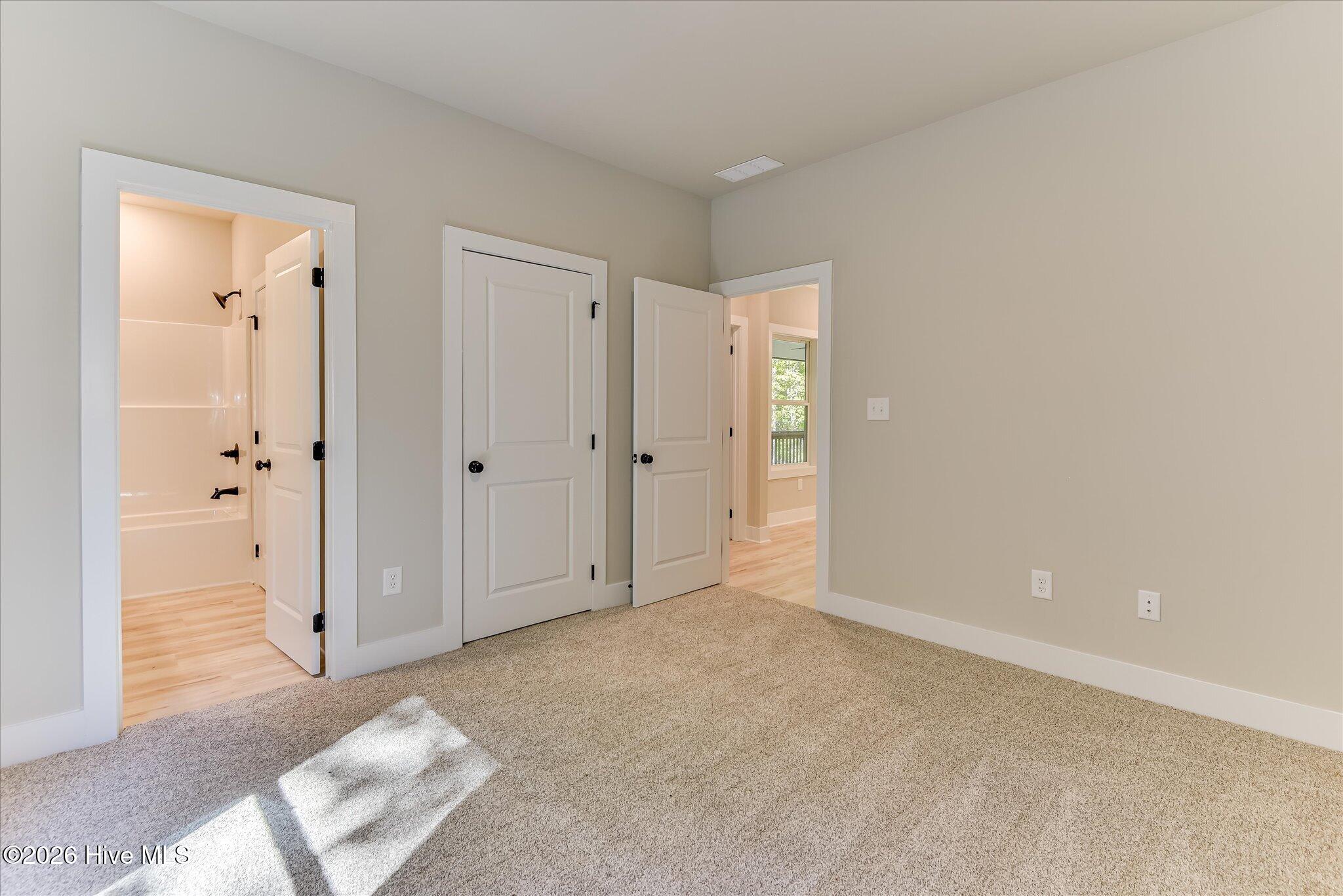 Bedroom 3 with shared access to full bathroom