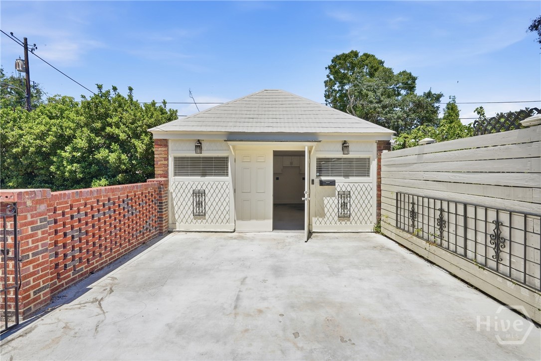 Storage building with new drive way for off-street parking