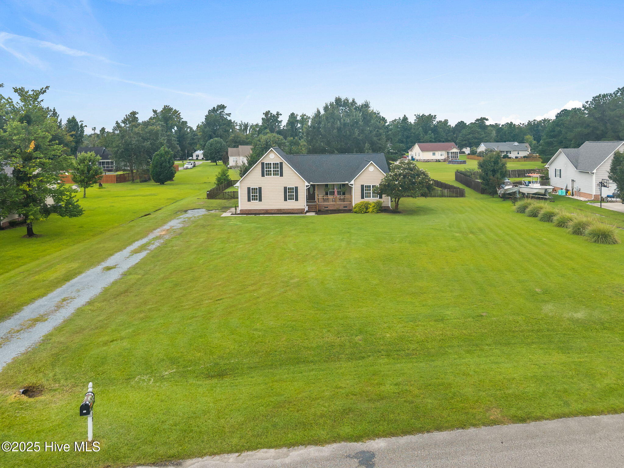 313 Oakmont Drive, Hampstead, NC 28443 – photo 4: 4-web-or-mls-DJI_20250811101047_0190_D