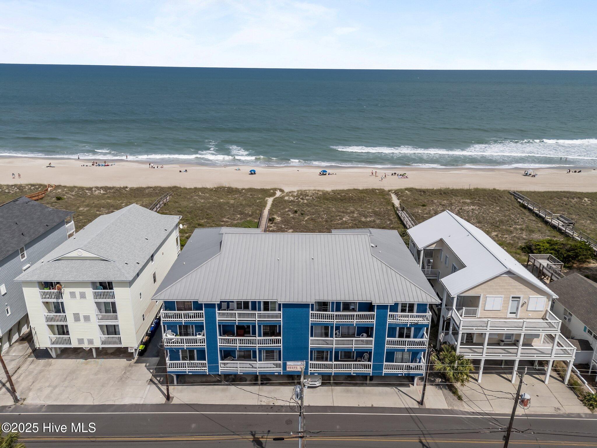 608 Carolina Beach Avenue N 3c, Carolina Beach, NC 28428 – photo 3: 52-web-or-mls-DJI_20250509150954_0761_D