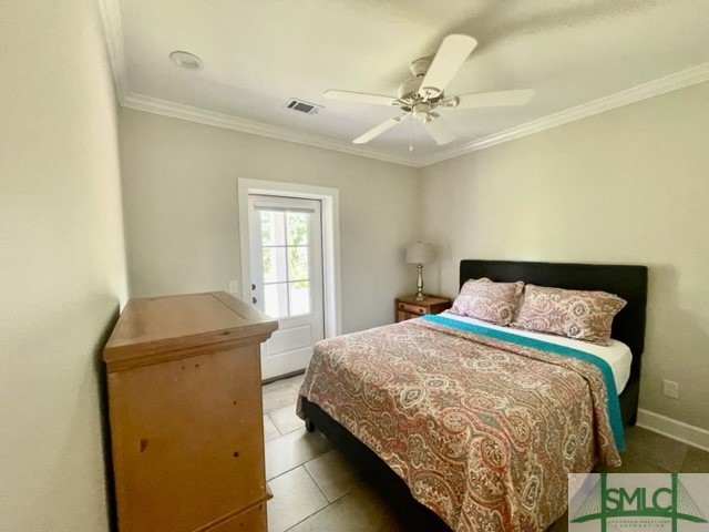 Bedroom with access to back porch