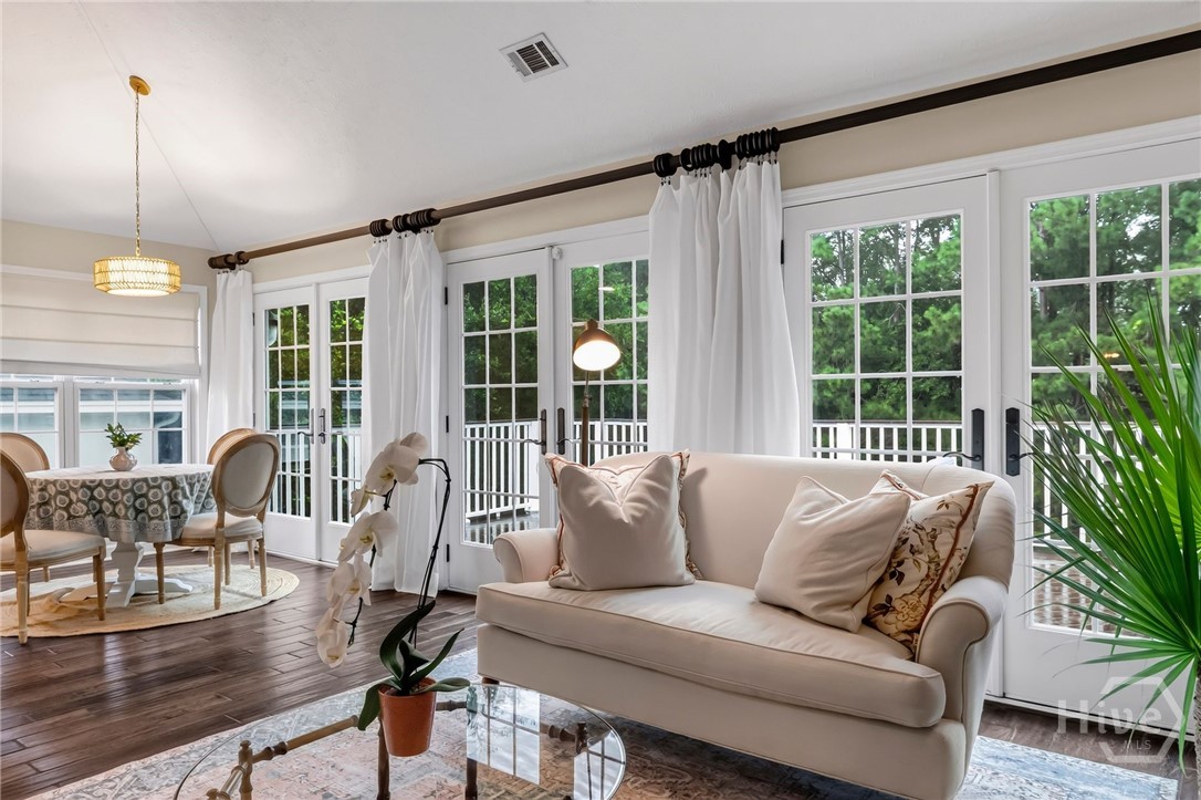 Family Room with 3 sets of French Doors