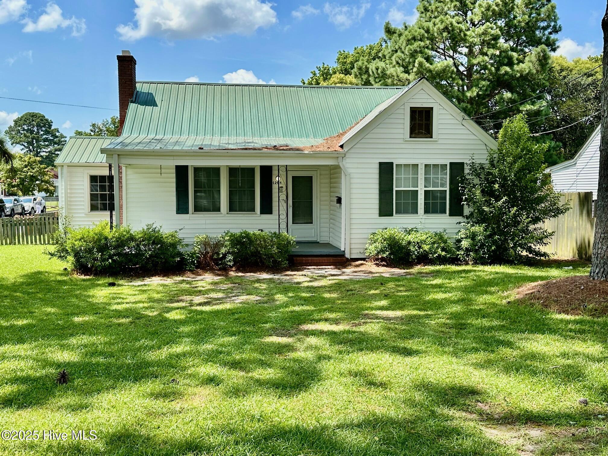 Welcome to this adorable 2-bedroom, 1-bath home nestled on a spacious corner lot in the desirable West End Subdivision in the Heart of Williamston! Whether you're a first-time homebuyer or a savvy investor, this low maintenance gem may be just the HOME for you!

Conveniently located just minutes from schools, shopping, and all the essentials of small-town living!! Inside, you'll find a cozy living space featuring a fireplace, a separate dining room, a galley-style kitchen, and a dedicated laundry room for added convenience!  This house is complete with a metal roof and natural gas for heating!

Step outside to relax, grill, or enjoy a cup of coffee on the back porch... overlooking a fully fenced-in backyard which would be ideal for pets, kids, or gardening enthusiasts.

One of the standout features of this property is the large, wired barn/workshop, complete with a garage door, entry doors, and even a kitchen.  This barn/workshop has the room and features for your projects, hobbies,  game room, or entertaining!  It is also great if you are in need of extra storage.... the possibilities are endless!

Don't miss this opportunity to own a charming move-in-ready home with tons of potential in a prime location!!

Schedule your showing today!!

''SOLD AS IS''