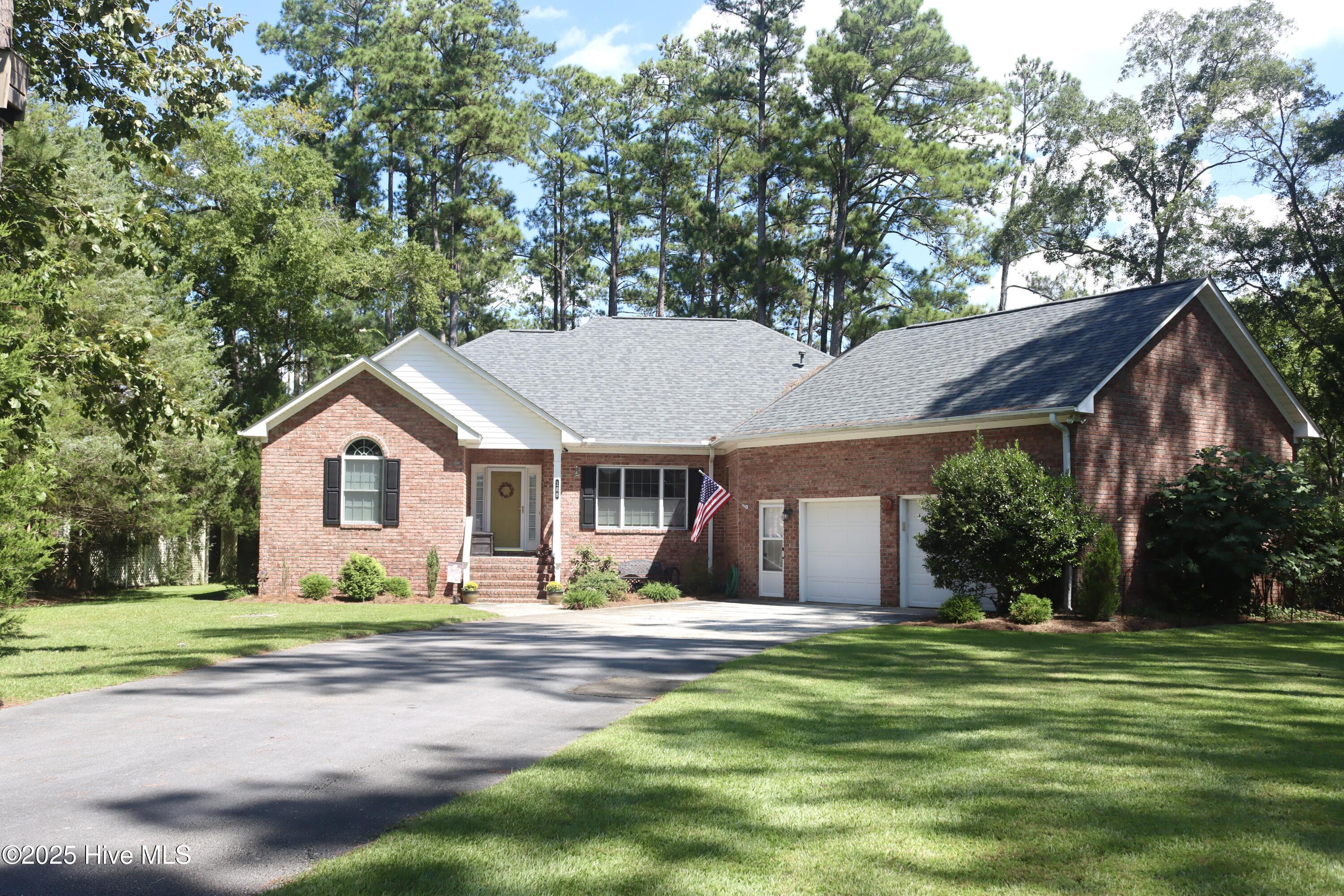 188 Quail Road Merritt, North Carolina Stunning waterfront 3 bedroom 2.5 bath brick home sitting on the shore of beautiful Ball Creek. This home boasts vaulted ceilings in the great room, kitchen and dining room. Master ensuite with great water view and a huge walk in closet. Master bath has a jacuzzi tub and walk in shower. The spacious kitchen has granite counters, stainless appliances, an island in the middle, and opens to the waterfront breakfast nook. Oversized 2 car garage with a finished room above is perfect for an office, workout, or hobby room. Attic storage. Waterfront deck and screened porch are perfect places to relax with a morning cup of coffee watching the wildlife stroll through your yard. Pop in the vinyl panels when the temps go down to use the porch year round. Yard is a gardeners dream to grow flowers, vegetables and fruit. A lot of thought went into the building of this lovely home. Minutes to the Bay River, ICW, and Pamlico Sound. Bring your water toys and explore all our beautiful creeks, rivers, and sounds!