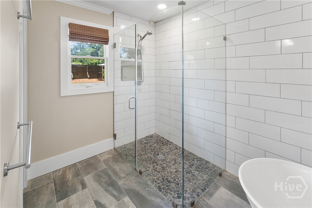 beautiful shower with pebble floor