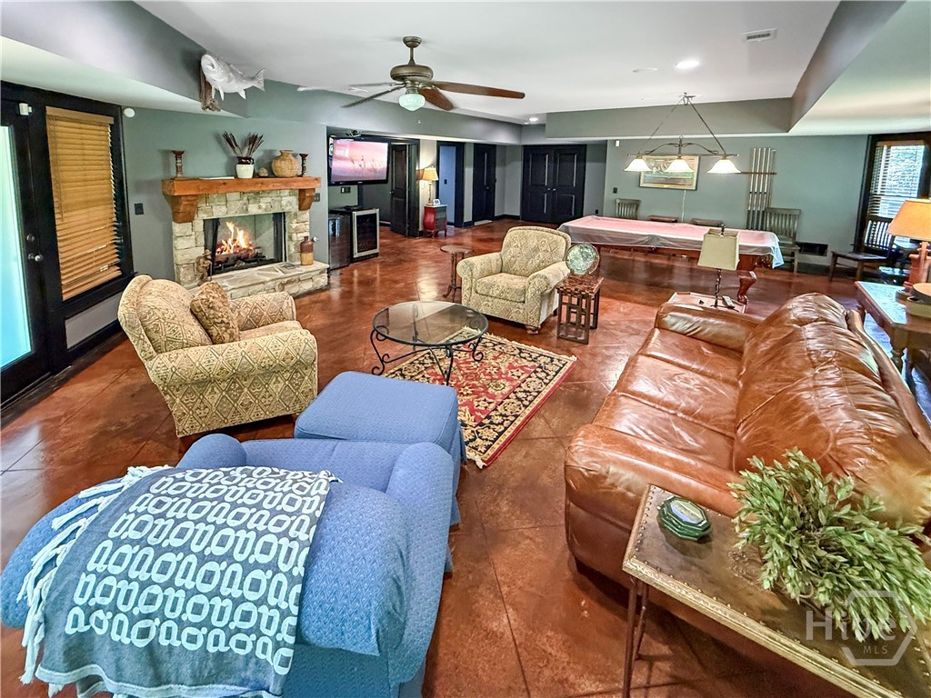 Sitting area on the Terrace Level w/stone fireplace