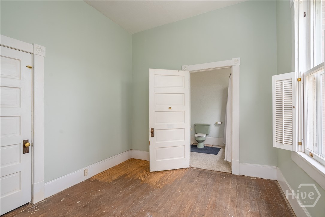 BEFORE - Upstairs walk-through closet
