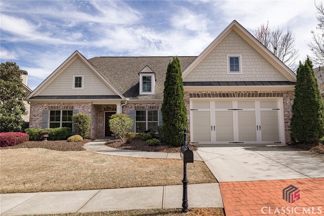Beautiful, light filled home in the desirable Courtyard at Rowan Oak.  Located in one of our areas only gated communities, this three bedroom home checks off every box for one level living:  spacious living and dining areas, wonderful kitchen layout, easy access to outdoors, beautiful owner's suite and extra bedrooms on the main level for guests. The courtyard is perfect for someone who enjoys gardening but doesn't want an overwhelming amount of yard work.  Enjoy the yard from the shade of the screened porch.  This home seems like a hideaway from the hectic pace of day to day life, but it's so convenient to shopping, schools, and all that our area has to offer. Make plans to see this one today!