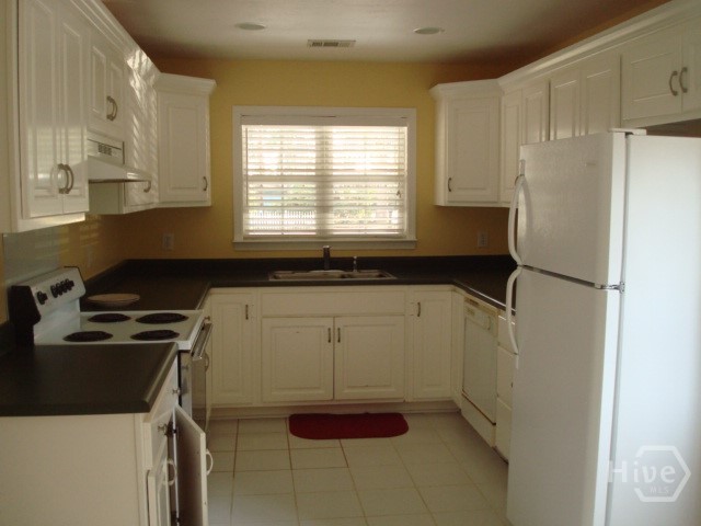 Kitchen with updated appliances. Loads of cabinet space and storage.
