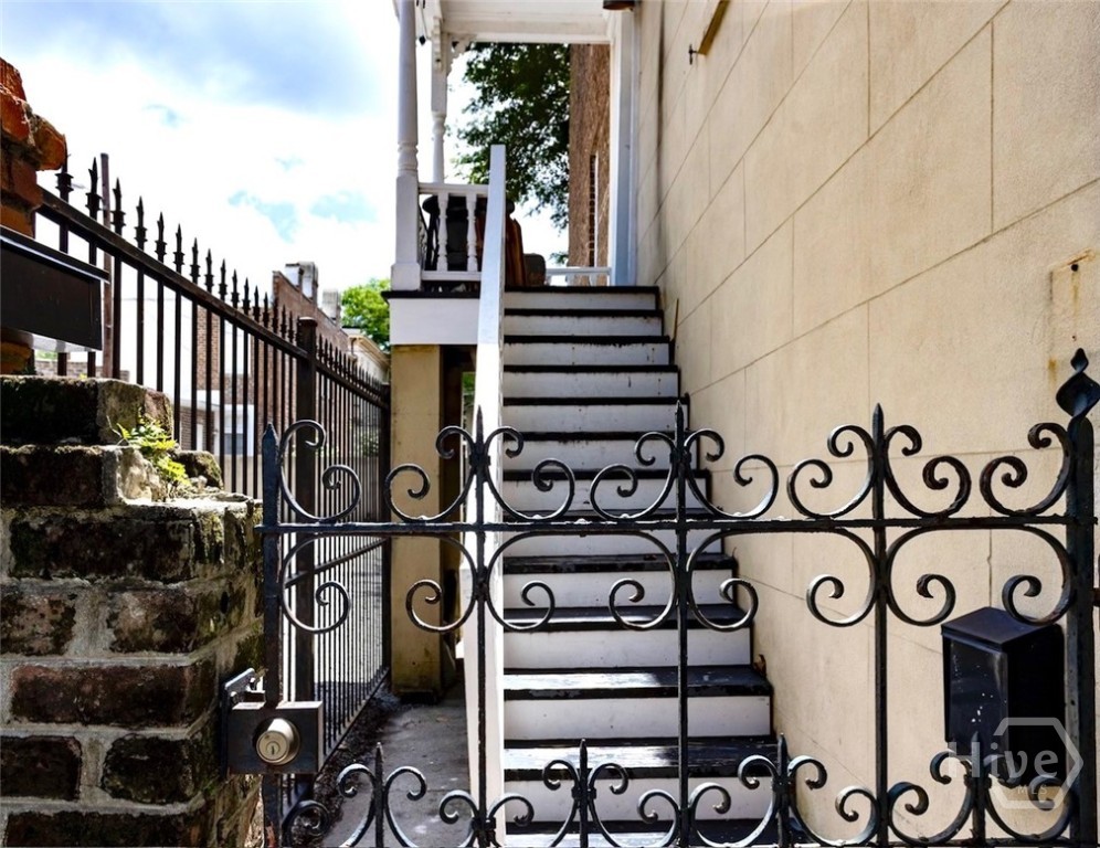 Stairwell to the upper apartment.