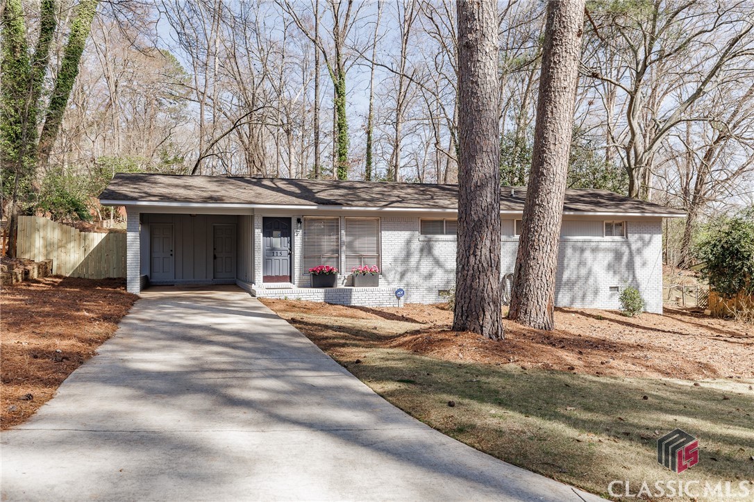This Forest Heights house is all dressed up and ready to go!  This 3 bedroom and 2 bath home was timelessly updated several years ago. Featuring two spacious living areas, this home offers the perfect blend of comfort and versatility. Whether you're entertaining guests or enjoying a quiet night in, the flexible layout provides plenty of space to fit your lifestyle.The updated kitchen boasts lots of cabinet space and a beautiful tile backsplash. The laundry is INSIDE and surrounded by more cabinet storage. The kitchen flows seamlessly into the dining and living areas, creating an inviting atmosphere. The primary suite offers a private retreat, while two additional bedrooms provide ample space for family, guests, or a home office.Step outside to enjoy the private backyard, perfect for relaxing or hosting gatherings. Conveniently located near shopping, dining, Piedmont Hospital, and UGA, this home combines the best of charm, updates, and location. Don't miss your chance to make it yours—schedule a showing today! xx