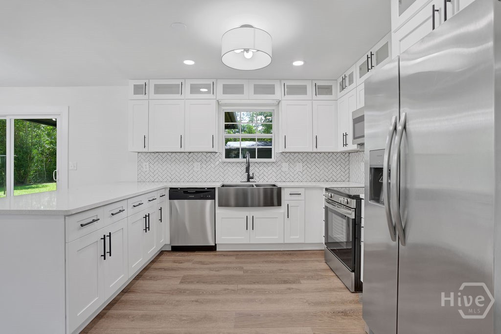 Stainless steel appliances and deep chef's sink