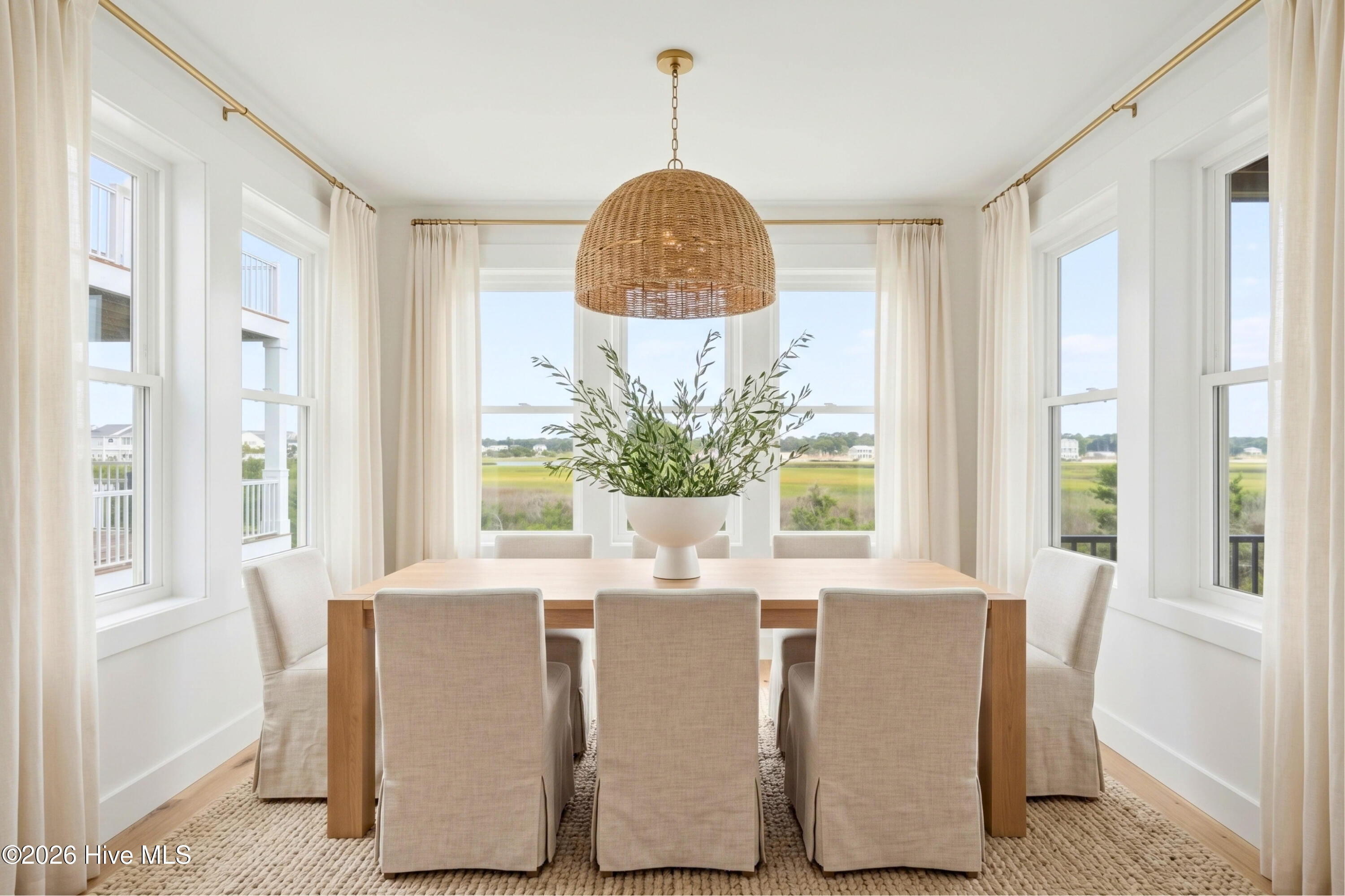 Dining room overlooking the salt marsh - staged