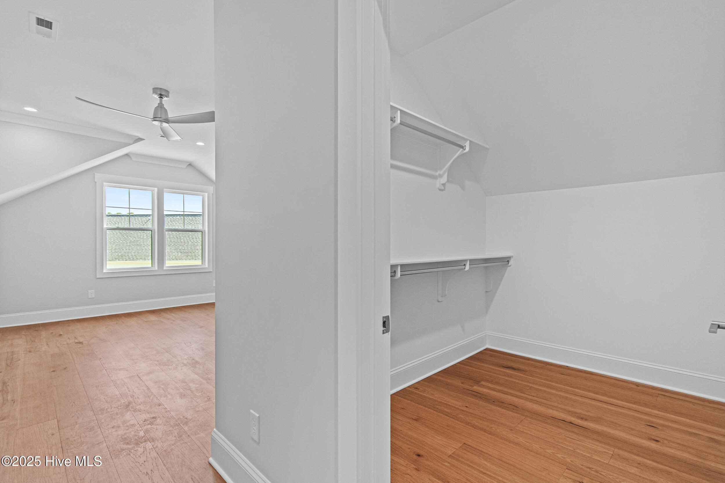 Large bedroom upstairs with closet