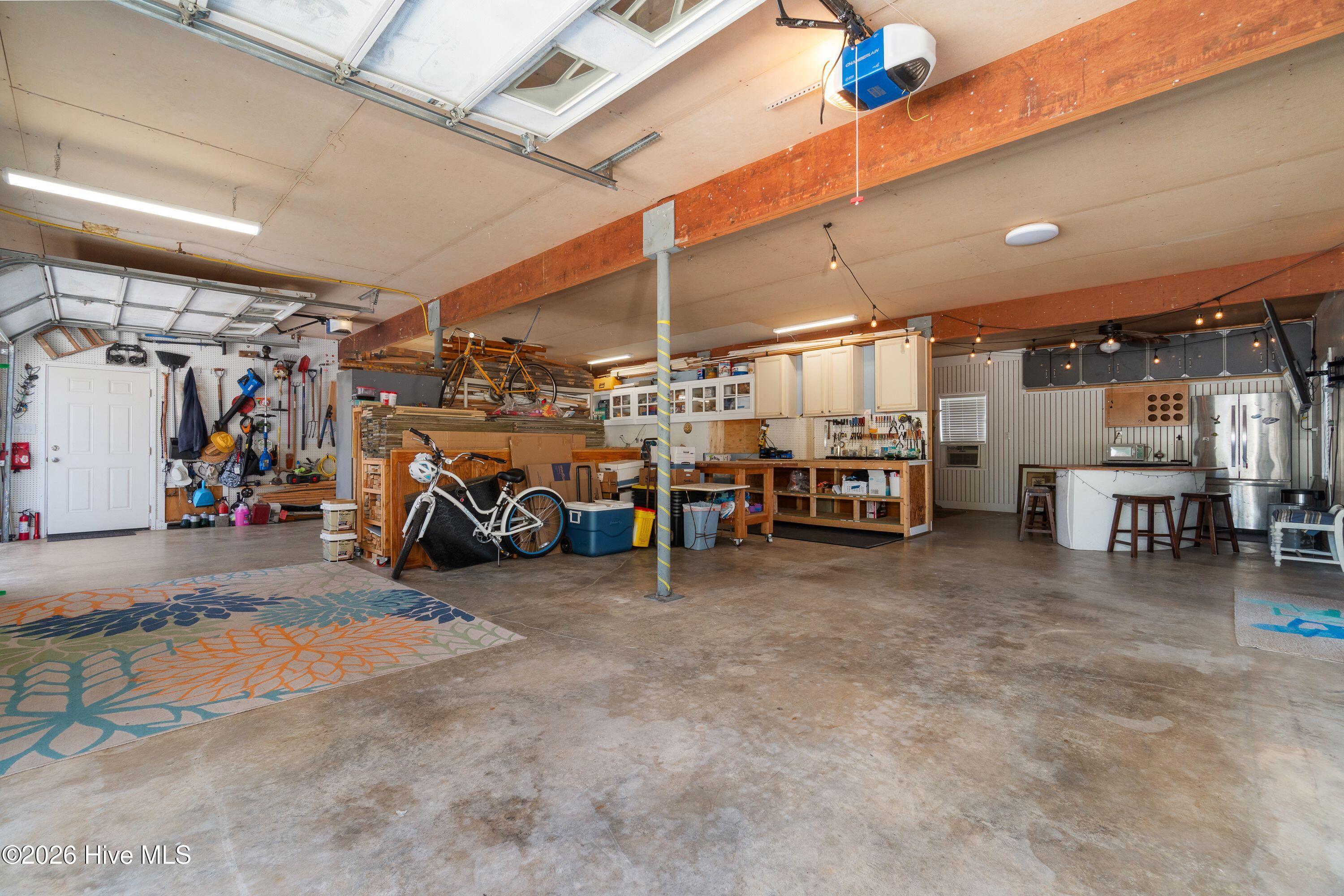 HUGE Garage for all the BEACH TOYS !! Fits Two cars, golf cart and extra room to boot!