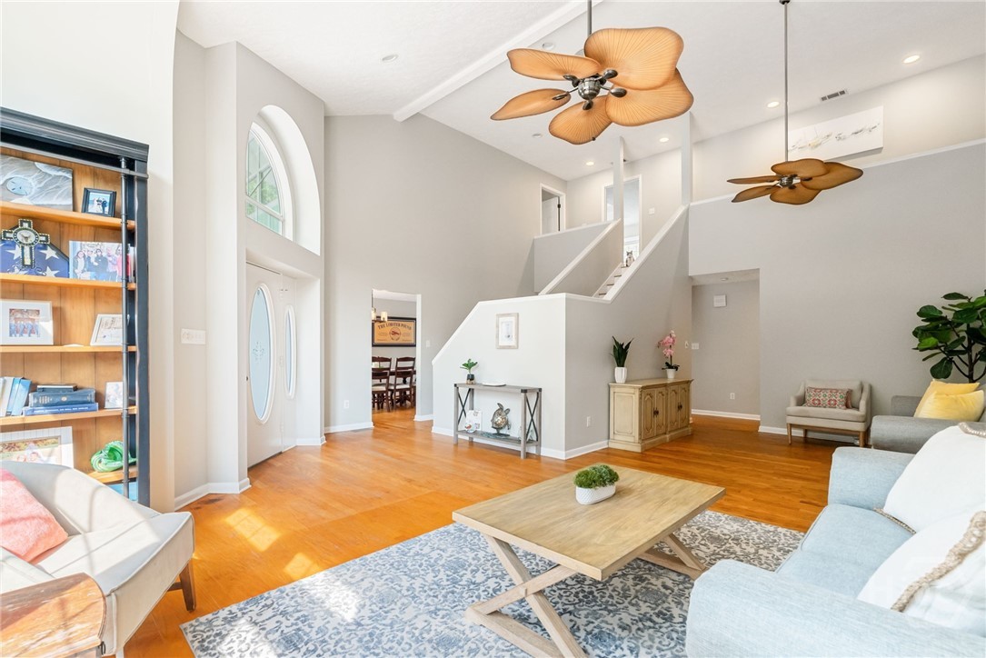 Open Concept Oversized Living Room Features Vaulte