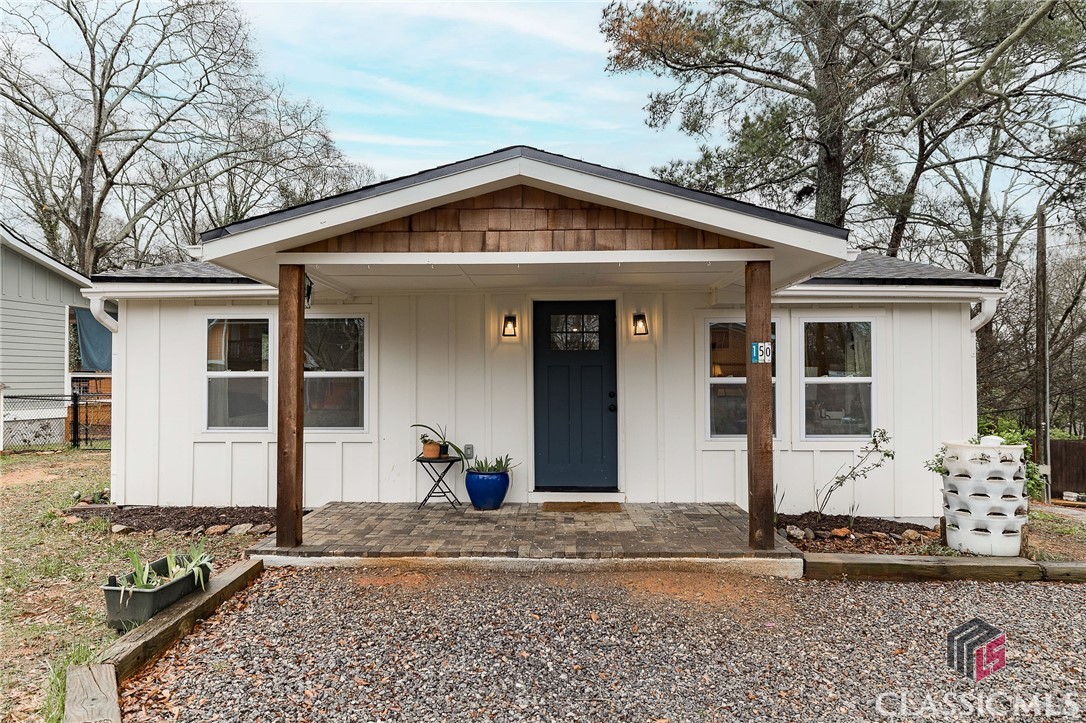 Charming contemporary Bungalow just a stone's throw from downtown is now available! This lovely home underwent a complete renovation in 2021, leaving no detail untouched. With its vaulted ceilings, open floor plan, shiplap walls, and calming colors, the space feels fresh, welcoming, and bathed in natural light. The layout features a split floor plan, with the primary bedroom and ensuite bathroom located at the front (complete with a pretty antique vanity!), and the second bedroom with an additional full bath (featuring great patterned tile!) situated at the back of the house, providing much-needed privacy and space. The eat-in kitchen is thoughtfully designed, with ample cabinet space, low-maintenance granite countertops, and stainless steel appliances. French doors off the kitchen lead to an expansive deck overlooking the tranquil, fenced-in backyard - the ideal spot to entertain friends or enjoy a quiet morning coffee. Nearly everything in this home is less than 3 years old: roof, HVAC system/ductwork, water heater, plumbing, electrical, insulation (spray foam), you name it! Conveniently and centrally located, this bungalow offers all the perks of in-town living: updated and upscale, just a mile from downtown and the University of Georgia, and only minutes from the Loop. Don't let this opportunity slip by - make this charming property your own today!
