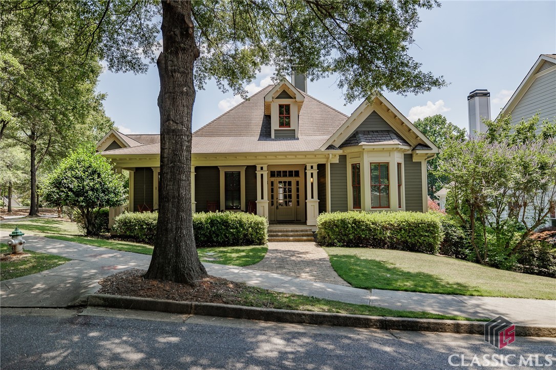 This is the one you have been waiting for in West Athens's exclusive neighborhood of Oak Grove! This stunning, completely renovated 3-bedroom, 2-bathroom ranch-style residence is a masterpiece of modern living. Every inch of this home has been meticulously upgraded to offer the ultimate in comfort and style.Step inside and be greeted by the rich, gleaming hardwood floors that flow seamlessly throughout the open-concept layout. The abundance of windows floods the home with natural light, creating a warm and inviting atmosphere in every room.The heart of the home, the kitchen, boasts beautiful polished marble countertops and top-of-the-line appliances, perfect for culinary enthusiasts and entertainers alike. Adjacent to the living space, a cozy office provides a quiet space for work or study.Retreat to the luxurious primary suite, where the completely renovated bathroom exudes spa-like elegance with its modern fixtures and finishes. Two additional bedrooms offer ample space for family or guests; the second bathroom is equally well-appointed.Enjoy Georgia's beautiful weather on the covered front porch, ideal for morning coffee, or the covered back porch, perfect for evening relaxation. The attached garage not only offers convenient parking but also features a walk-up attic with abundant storage space. This area presents an exciting opportunity to convert to additional finished square footage, such as an office, exercise room, or game room.This home is truly turnkey, with every detail thoughtfully addressed in the renovation. This pool and tennis community offers easy access to local amenities, schools, and shopping.