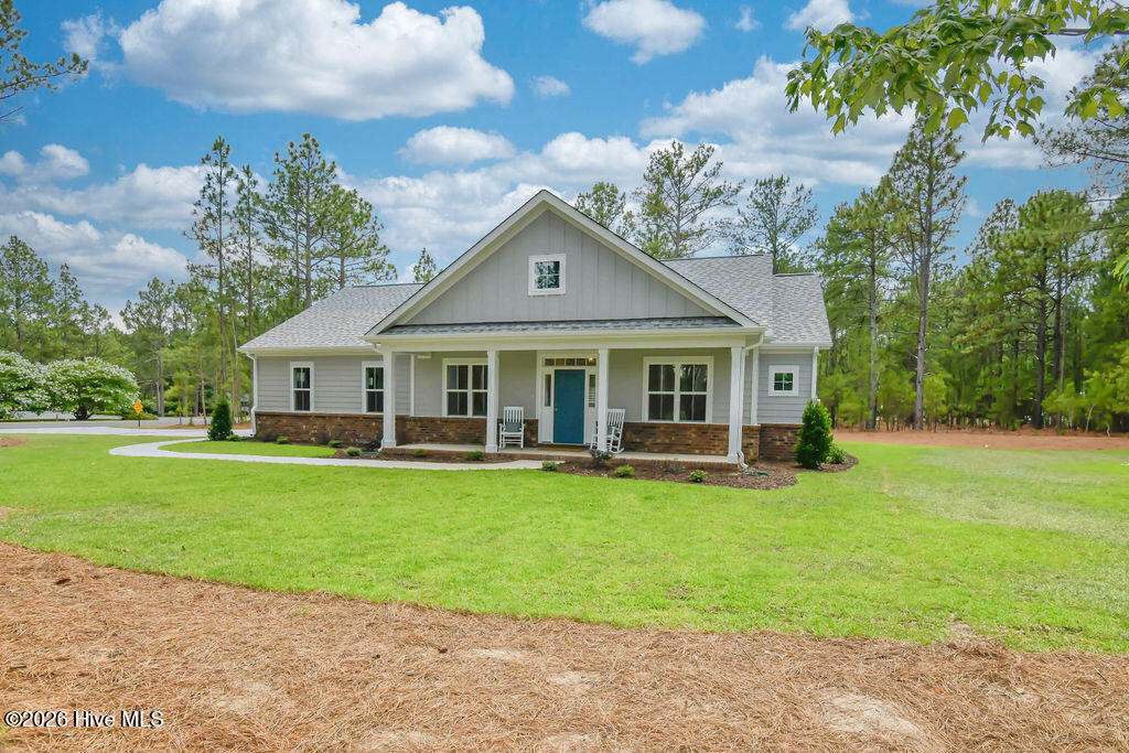 Exterior photo of 120 Edgewater Drive, West End, NC 27376. MLS: 100587816