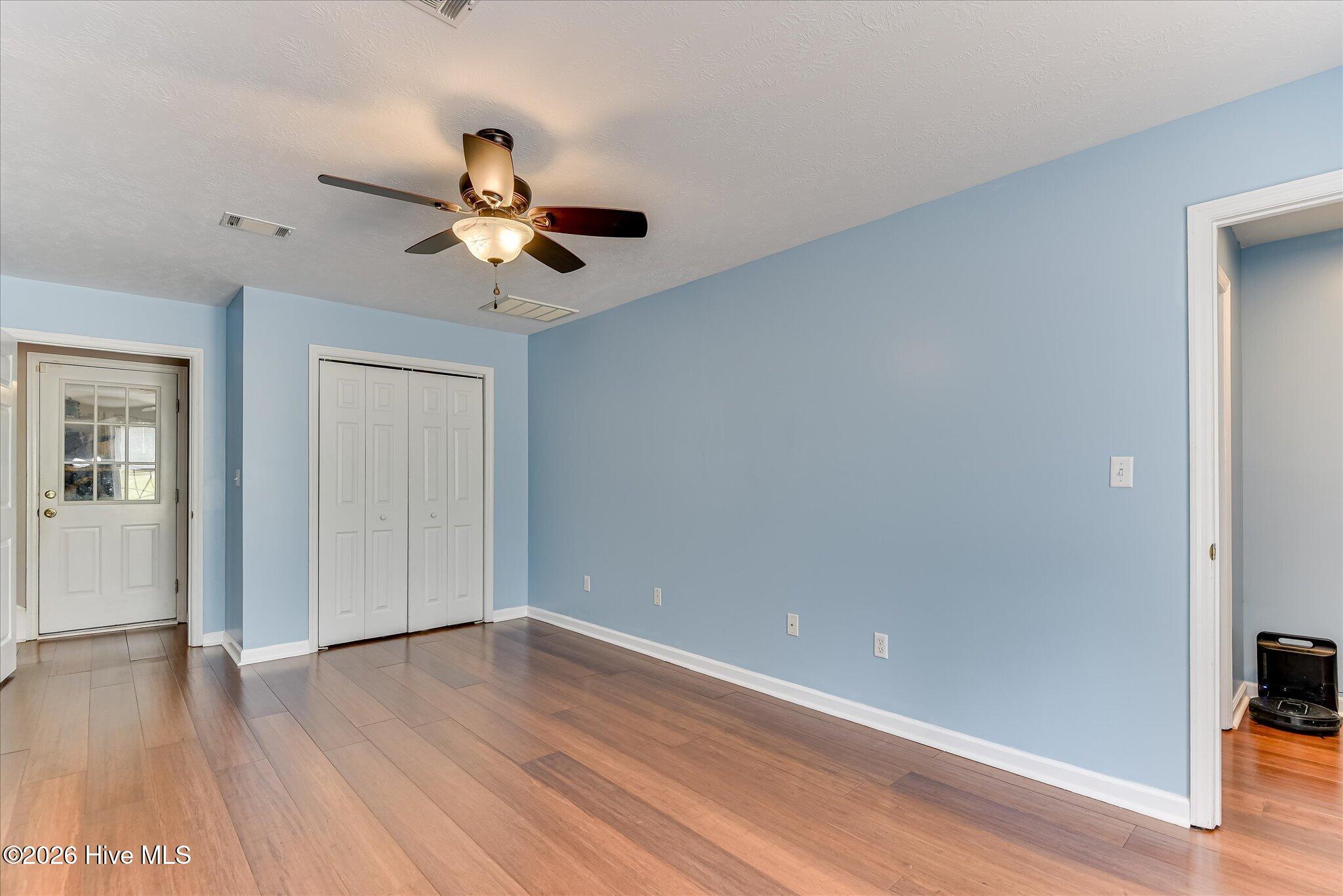 Lovely space with the wood floors that are featured throughout the home.
