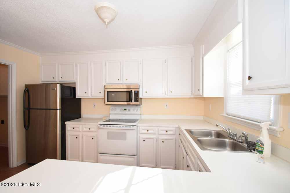 Exterior photo of 3828 Sterling Pointe Drive O5, Winterville, NC 28590. MLS: 100599040