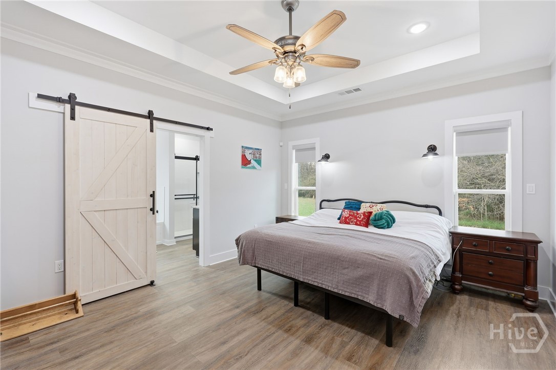 Large master suite with barn door