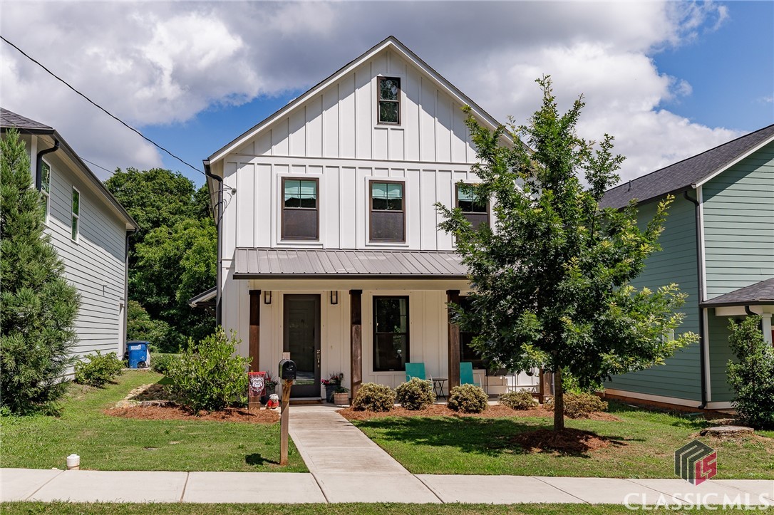 Welcome to 230 Lake Street - A modern gem in The Cottages at Hilltop, thoughtfully designed and built by J.W. York. Wrapped in a low-maintenance package for effortless living, this address puts the best of Athens right at your doorstep. The popular Hilltop floor plan strikes the perfect balance between open-concept and comfortable privacy. Inside, the natural light filled living area connects seamlessly to a stylish kitchen outfitted with quartz countertops, artistic tile backsplash, and designer lighting that elevates the whole space. Upstairs, the airy Primary Bedroom offers a peaceful retreat, complete with a generous walk-in closet and a sleek ensuite bath. Two additional bedrooms and a full bath give you the flexibility to host guests, work from home, or carve out a creative corner. Step outside and you’ll find a covered back patio just off the kitchen and dining area - perfect for evening grilling or relaxed morning coffee. And with a shared green space just steps away, there’s plenty of room to play fetch with Fido or stretch out in the sunshine. You’ll never be far from the action at this location! Bike, Walk, or Bus to Downtown Athens, the University of Georgia, or the new Akins Ford Arena. Explore the North Oconee River Greenway or discover a new favorite restaurant or coffee shop. Whether you're planting roots or starting fresh, 230 Lake Street is the perfect starting point for the lifestyle Athens is known for. Ready to make your move and call 230 Lake Street home? Schedule a tour today.