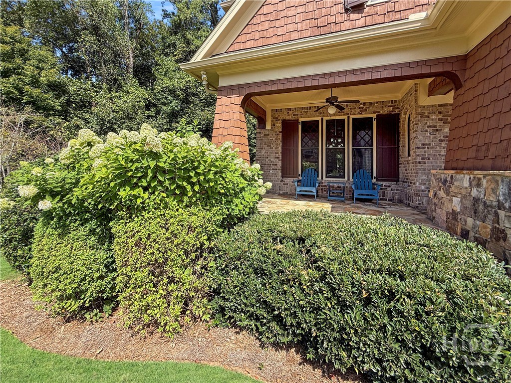 Enjoy the private front covered porch w/ a fan.