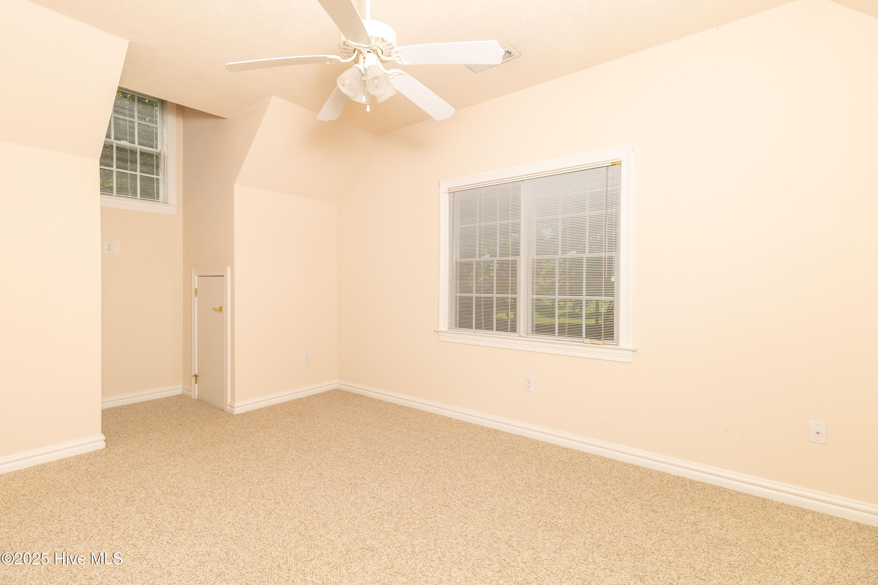 Private suite living area over garage