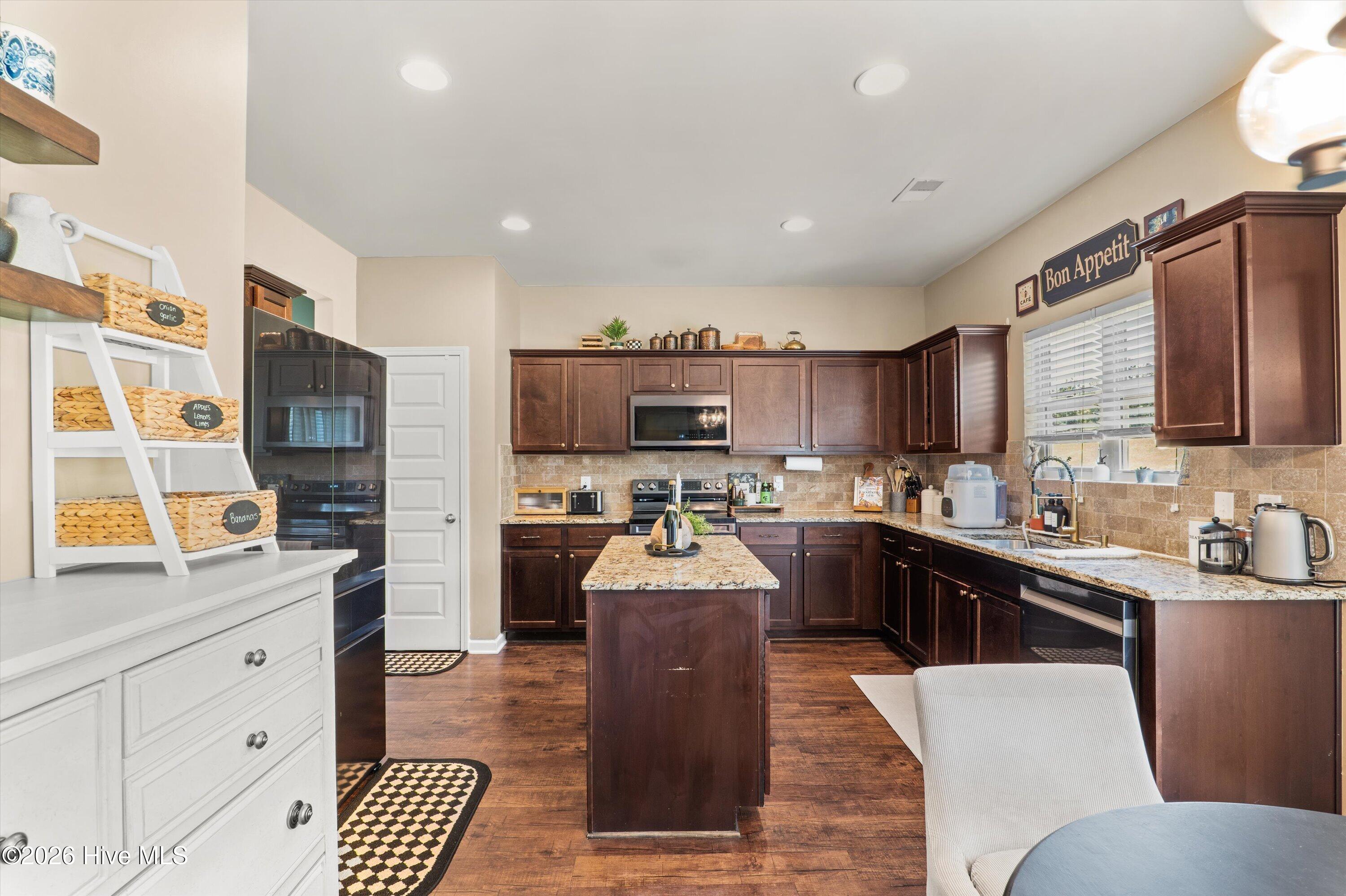 Kitchen with island and breakfast area