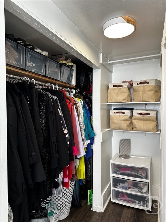 Large closet between bathroom and bedroom